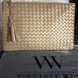 Virginia Wolf clutch in a metallic gold/green color